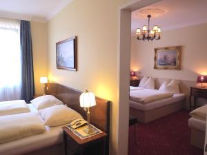 En eller flere senger på et rom på Hotel Turnerwirt