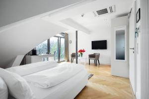 TV a/nebo společenská místnost v ubytování Hotel Seehof