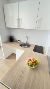 A cozinha ou kitchenette de Appartement cosy et lumineux accès centre Orléans