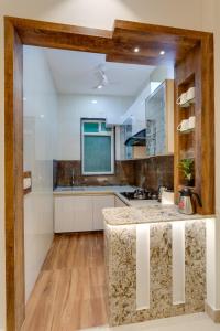 Virtuvė arba virtuvėlė apgyvendinimo įstaigoje Avanti Tenantry- Gurugram
