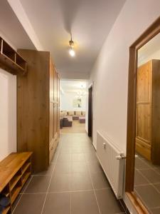 Postel nebo postele na pokoji v ubytování Predeal Escape Apartment