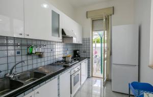A kitchen or kitchenette at Villa Cavarra