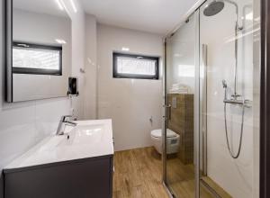Kúpeľňa v ubytovaní Martinus Apartments