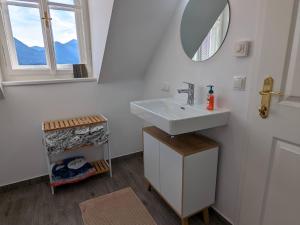 a bathroom with a sink and a mirror at Apartment in Mariazell near ski area in Mariazell