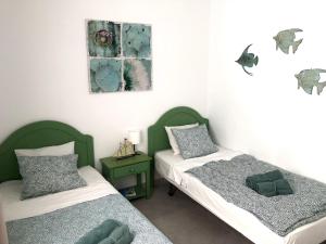 Posteľ alebo postele v izbe v ubytovaní CASA RENE, lovely apartment close to the center, Puerto del Carmen