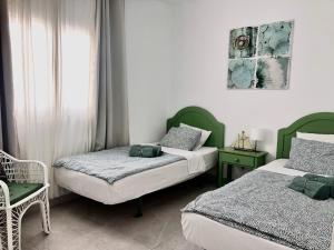 Posteľ alebo postele v izbe v ubytovaní CASA RENE, lovely apartment close to the center, Puerto del Carmen