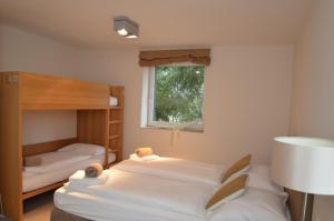 Krevet ili kreveti na kat u jedinici u objektu Apartmenthouse "5 Seasons" - Zell am See