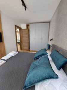 Una cama o camas en una habitación de Apartman Milovanović