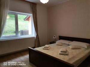 Ένα ή περισσότερα κρεβάτια σε δωμάτιο στο Casa Jasmin