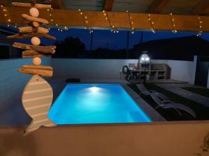 a swimming pool on top of a house at Casa Rural Alaejos in Alaejos