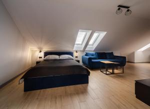 Posteľ alebo postele v izbe v ubytovaní Martinus Apartments