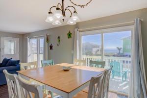 a dining room with a table and chairs at Living the Dream in Surf City