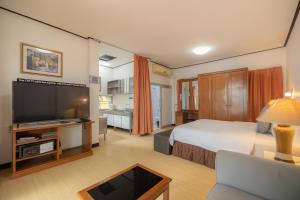 バンコク ラマ ホテルにあるベッド +121枚の写真