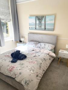 Un pat sau paturi într-o cameră la Sedgefield