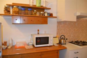 A kitchen or kitchenette at B&B La tarentilla