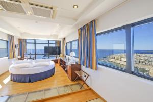 TV a/nebo společenská místnost v ubytování Hotel Bellavista Club-Caroli Hotels