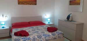 Voodi või voodid majutusasutuse Adorabile appartamento con vista panoramica toas