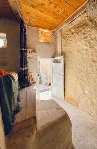 an empty room with a door in a building at Baben Home in Siwa