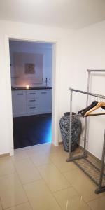 a kitchen with a sink and a counter in a room at SLEEP WELL Apartments, FEWO Falkenburg in Detmold