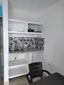 Virtuvė arba virtuvėlė apgyvendinimo įstaigoje Avadia del Mar