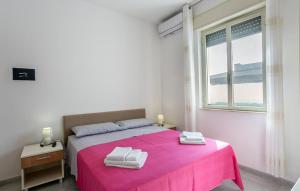 A bed or beds in a room at Villa Cavarra