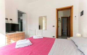 A bed or beds in a room at Villa Cavarra