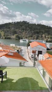 a view of a river from the roof of a building at Casa dos Avós in Castelo de Paiva