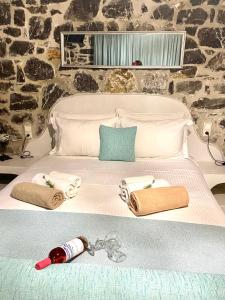 Posteľ alebo postele v izbe v ubytovaní Stelani Villas & Suites + 37 fotografií