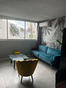 Posezení v ubytování Le Chacha - superbe appartement à 2 minutes de la plage à pied