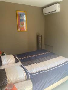 Postel nebo postele na pokoji v ubytování Le Chacha - superbe appartement à 2 minutes de la plage à pied
