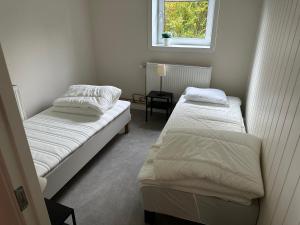 Postel nebo postele na pokoji v ubytování Lärkan21 Tvisegatan 24C