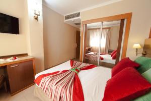 Posteľ alebo postele v izbe v ubytovaní Hotel Regio 2