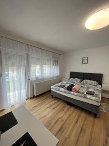 Posteľ alebo postele v izbe v ubytovaní OPG - ZM APARTMANI MARTINOVIĆ