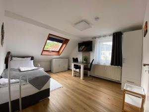 Postel nebo postele na pokoji v ubytování Apartment Q im Zentrum von Königsbronn