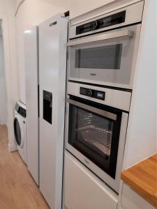 Kuchyň nebo kuchyňský kout v ubytování Apartamento con encanto en centro histórico Lugo -TineriaLucusHome