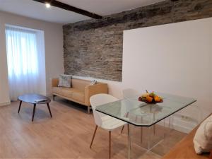 Posezení v ubytování Apartamento con encanto en centro histórico Lugo -TineriaLucusHome