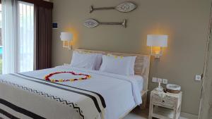 Kubu Garden Suites & Villas Nusa Dua客房内的一张或多张床位