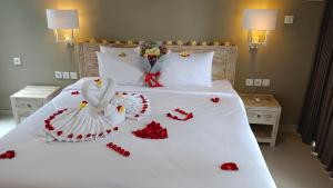 Kubu Garden Suites & Villas Nusa Dua客房内的一张或多张床位