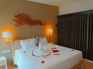Kubu Garden Suites & Villas Nusa Dua客房内的一张或多张床位