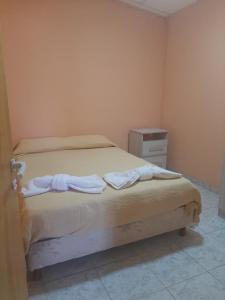 מיטה או מיטות בחדר ב-Dptos Mi refugio