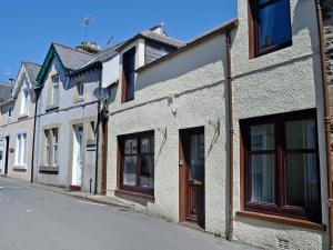 a row of houses on a city street at Summerlea Cottage in Moffat