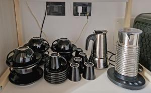 a group of pots and pans sitting on top of a stove at Ca' Nova - Burano in Burano