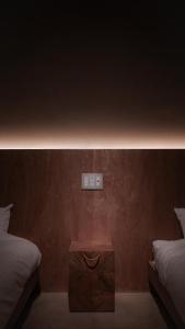 Letto o letti in una camera di deigo ISHIGAKI ｜沖縄石垣島の一棟貸し別荘［泥娯］