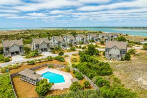 an aerial view of a home with a swimming pool at Beach Blessings in Topsail Beach
