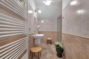 Koupelna v ubytování Rezidence Villa Gloria