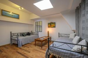 Ένα ή περισσότερα κρεβάτια σε δωμάτιο στο L'Eclose +82 φωτογραφίες