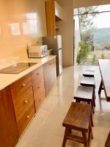 Kuchyň nebo kuchyňský kout v ubytování Dalat Topview Homestay
