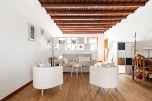 Istumisnurk majutusasutuses Italian Experience-Uriel Suite Apartment