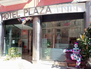 The facade or entrance of Hotel Plaza Inn