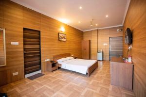 Postel nebo postele na pokoji v ubytování GP Hotels and Resorts